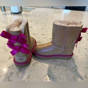 Very gently used toddler/little kid size 8 Uggs. Bailey Bow II Boot.